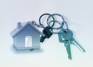 A house as a keychain with three keys